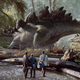 Stegosaurs walking in The Lost World.